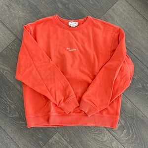 Acne Studios orange sweatshirt